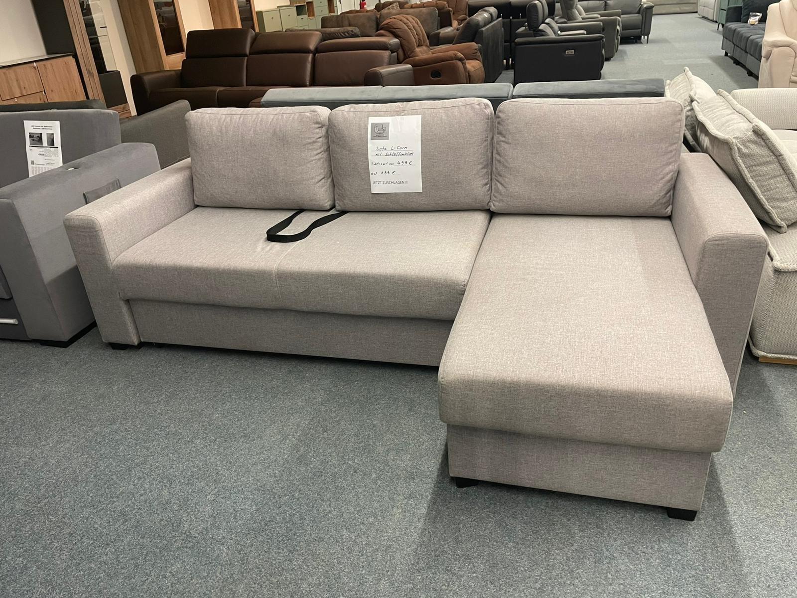 Grau Ecksofa mit Schlaffunktion & Bettkasten