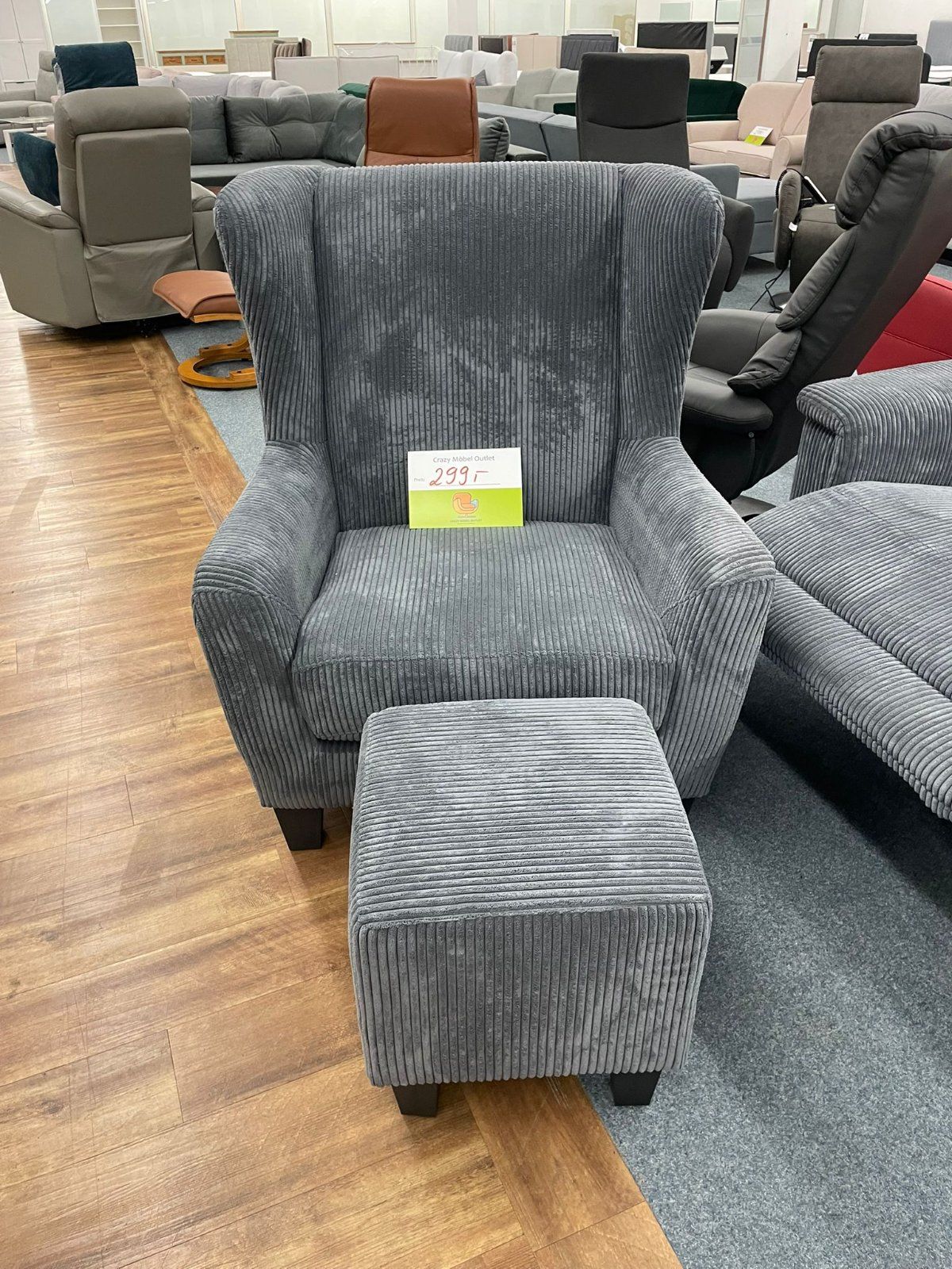 Eleganter Cord-Sessel mit Hocker - Grau