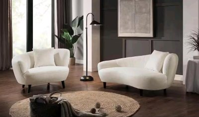 Loungesessel aus Strukturstoff mit Zierkissen